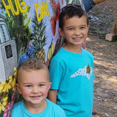 Photo of Benji and Braden outside
