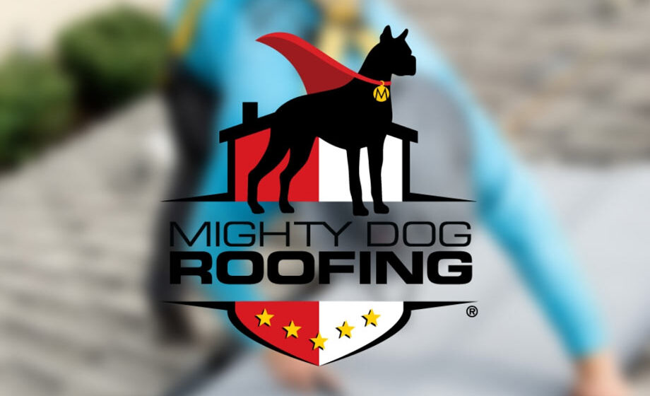Mighty Dog Roofing Logo - Black dog wearing a red cape illustration above black sans-serif type over blurred photo