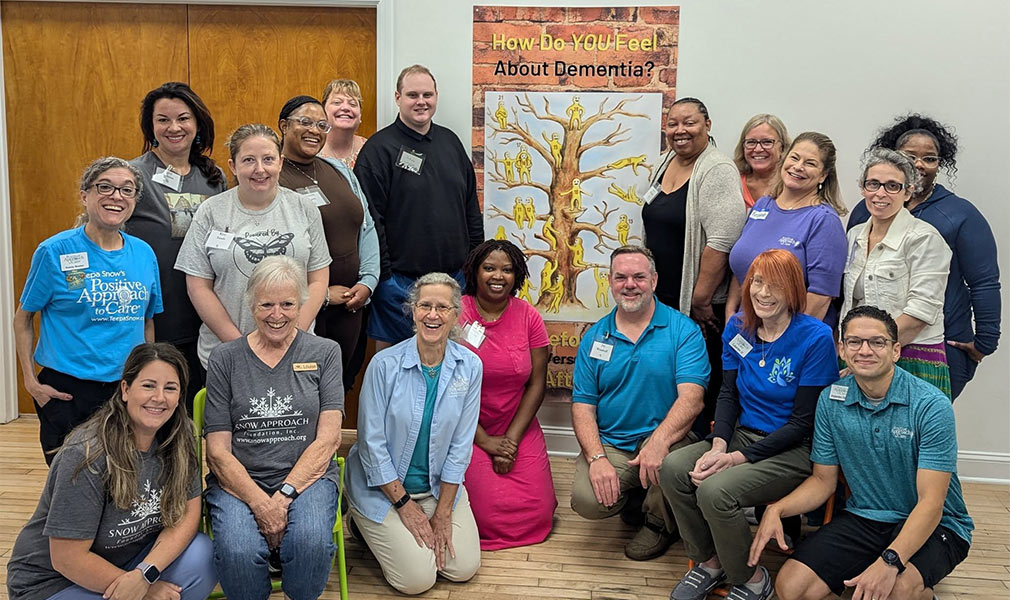 Group photo of Positive Approach to Care Certification event attendees