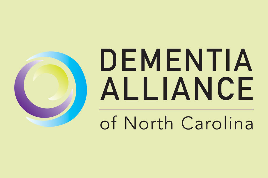 Dementia Alliance NC Logo - Black sans-serif type with cyan, purple, and green intertwined crescents to left