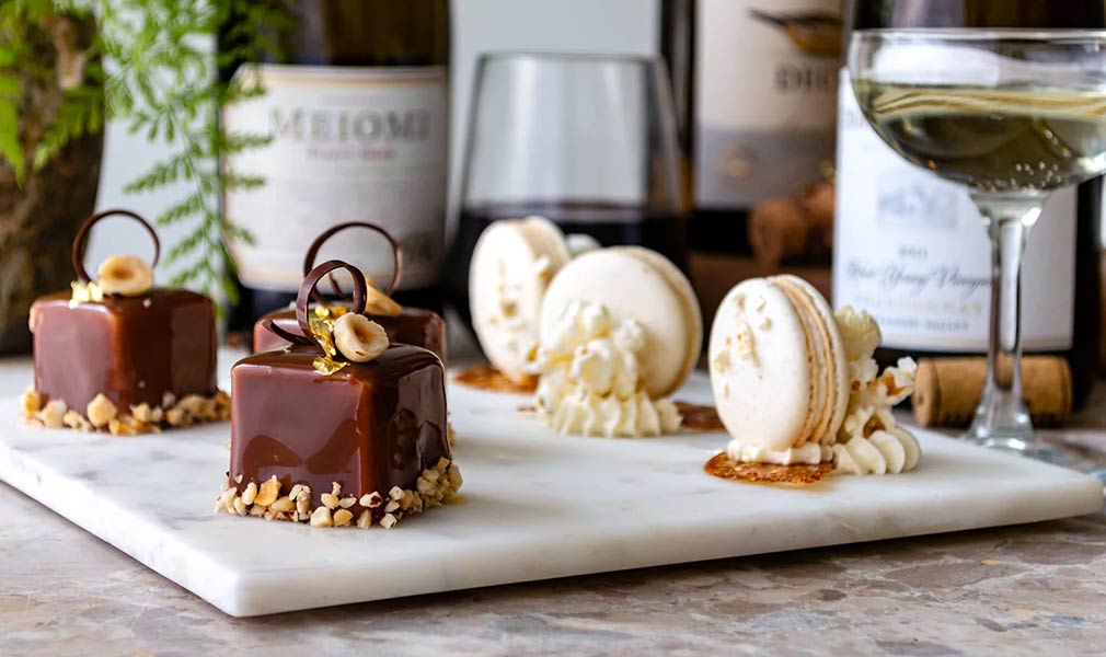 Photo of desserts and wine